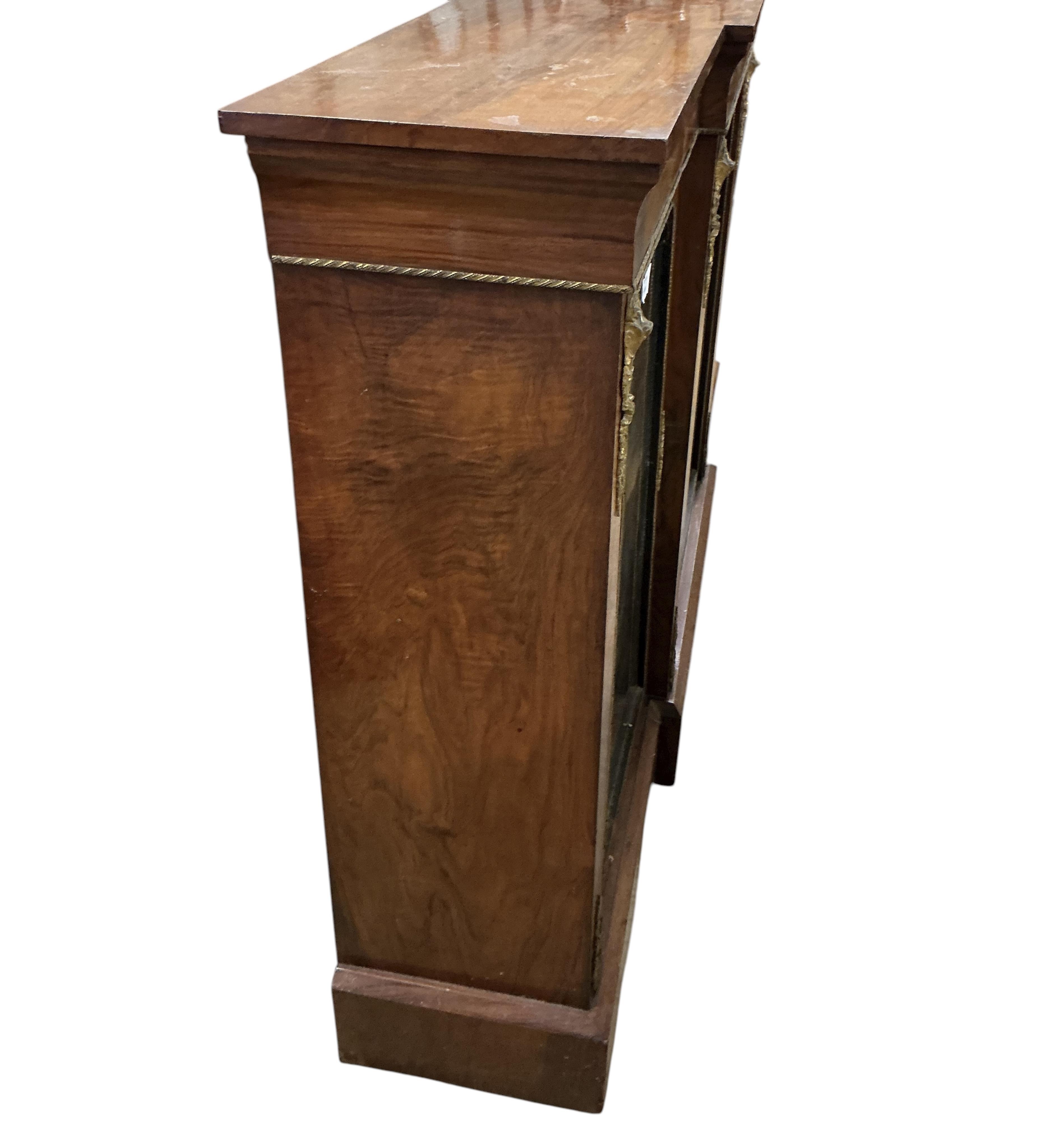A Victorian inlaid gilt metal mounted breakfront side cabinet, width 176cm, depth 34cm, height 105cm